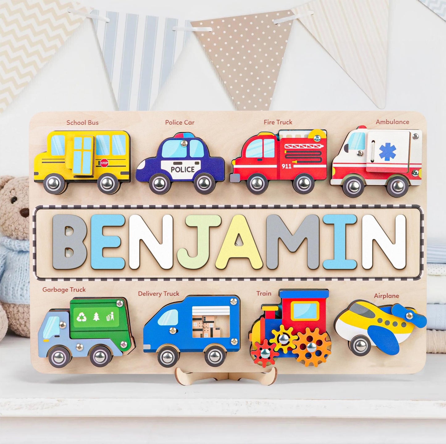 Personalized wooden name puzzle for kids featuring colorful vehicle theme, spelling 'BENJAMIN' with educational design.