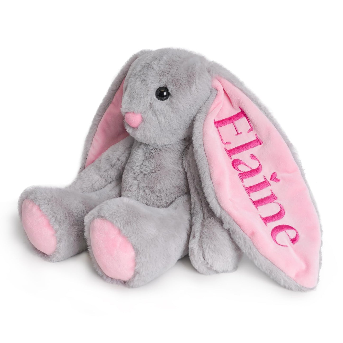 Personalized plush bunny toy with embroidered child's name 'Elaine' in pink on soft inner ears.