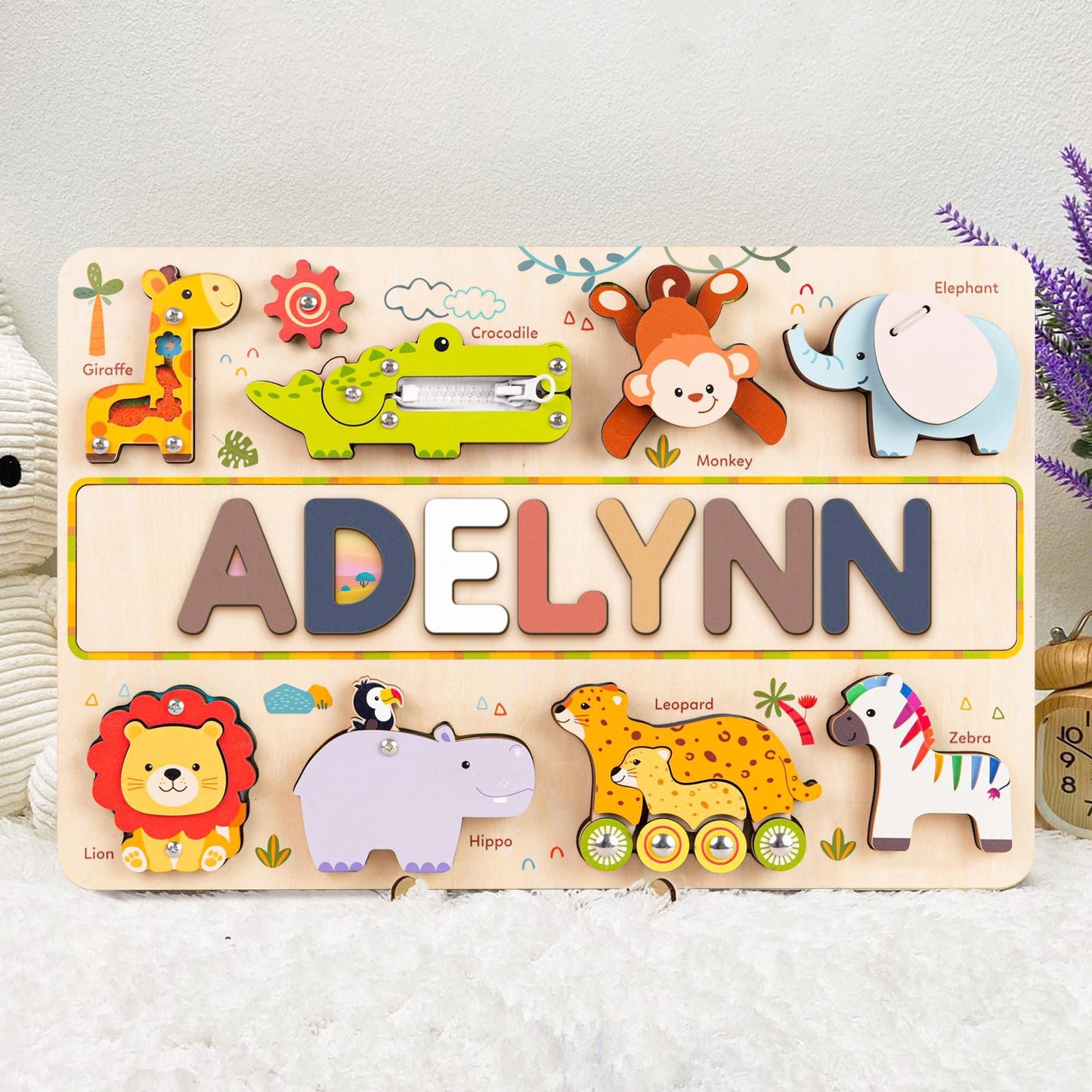 Personalized wooden animal name puzzle board featuring vibrant animals and the name 'Adelynn'.