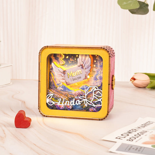 Personalized 3D Wooden Puzzle Night Light with angel wings, 'Mom' text, and floral design for Mother's Day gift.