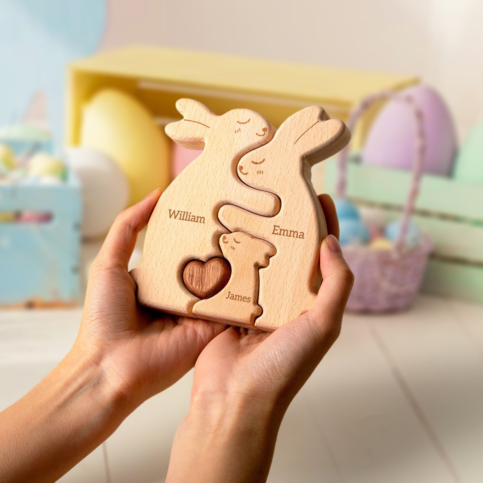 Personalized wooden rabbit family puzzle with names William, Emma, and James, perfect for Easter decor.
