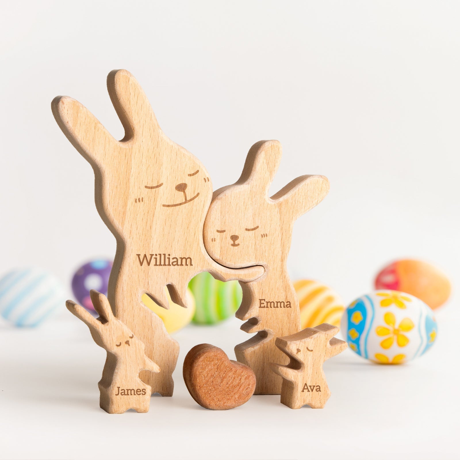 Personalized wooden rabbit family puzzle featuring names William, Emma, James, and Ava, perfect for home decor.