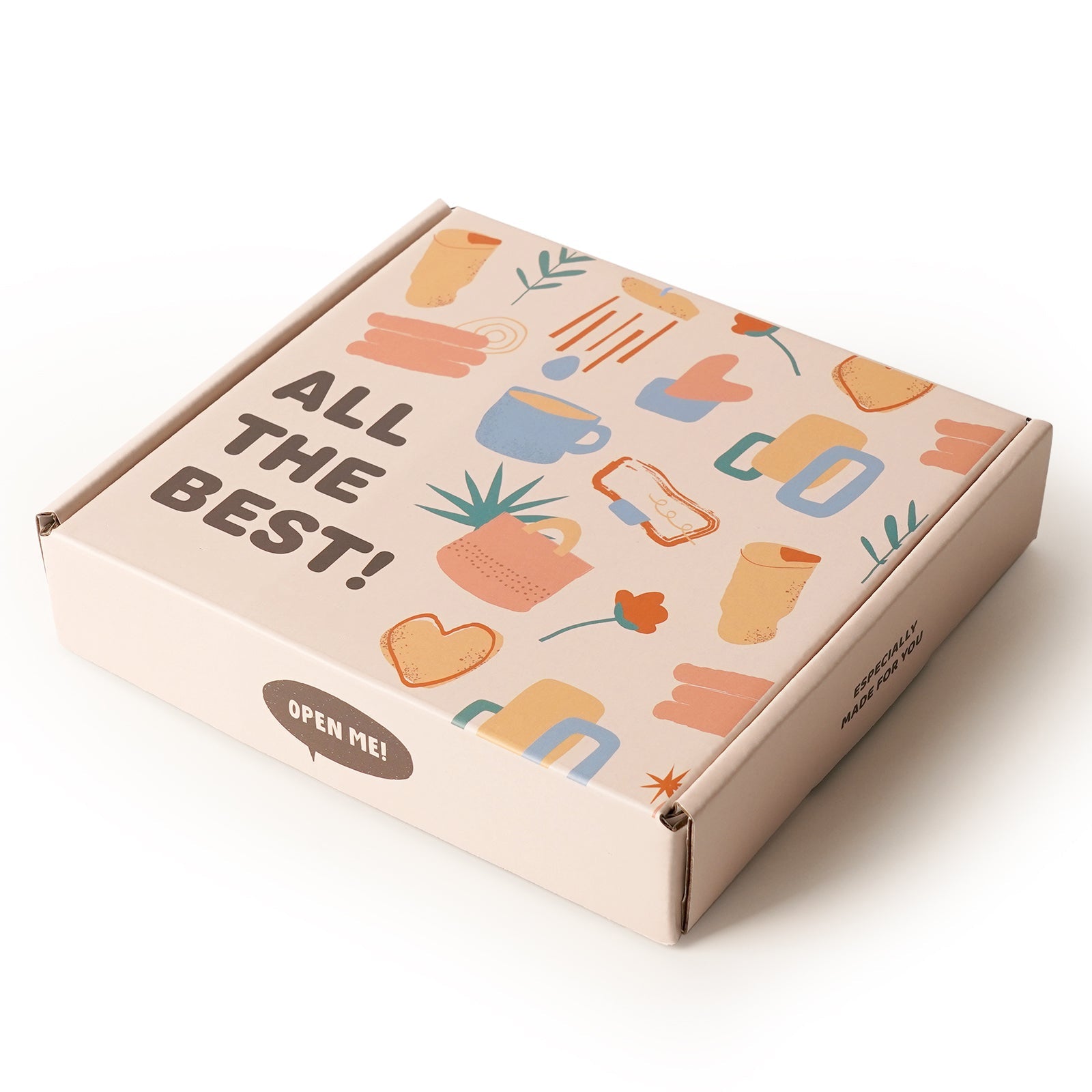 Family puzzle gift packaging with playful design, featuring colorful illustrations and the phrase 'ALL THE BEST!'.
