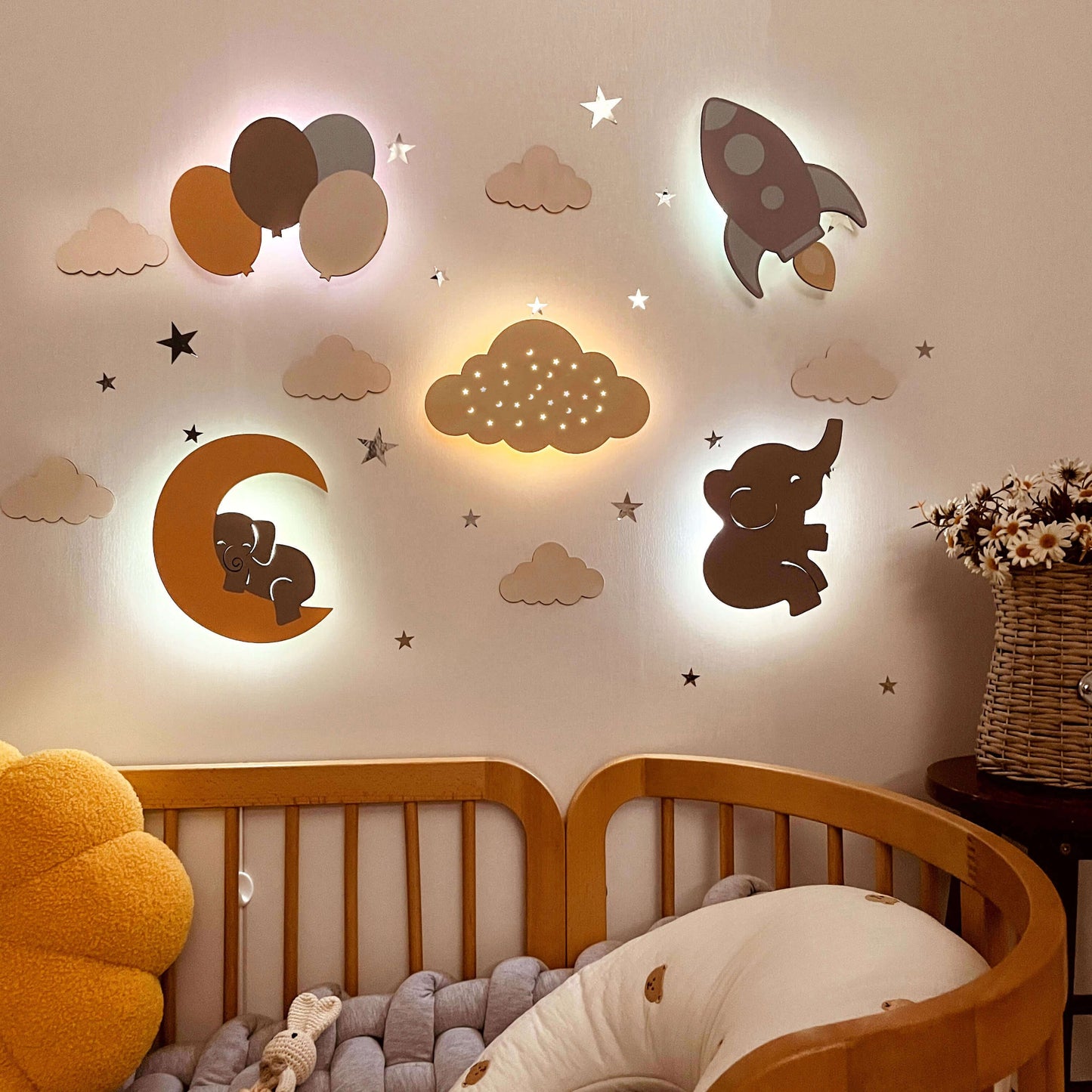 Wooden Baby's Room Wall Light Set featuring elephant and moon designs, creating a calming bedtime atmosphere.