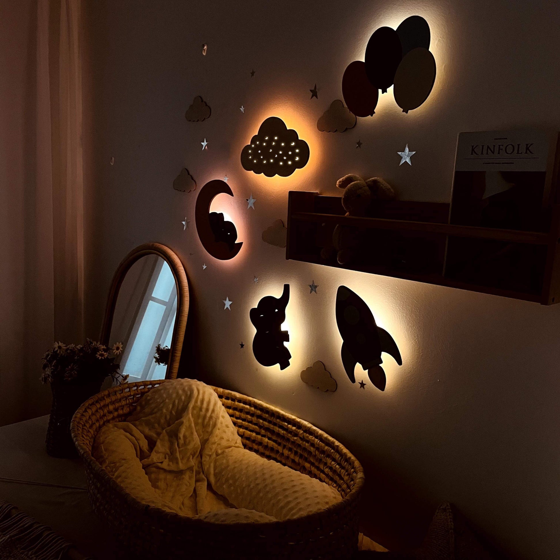 Wooden baby's room wall light set featuring dreamy night theme with stars, clouds, and playful designs for calming nursery decor.