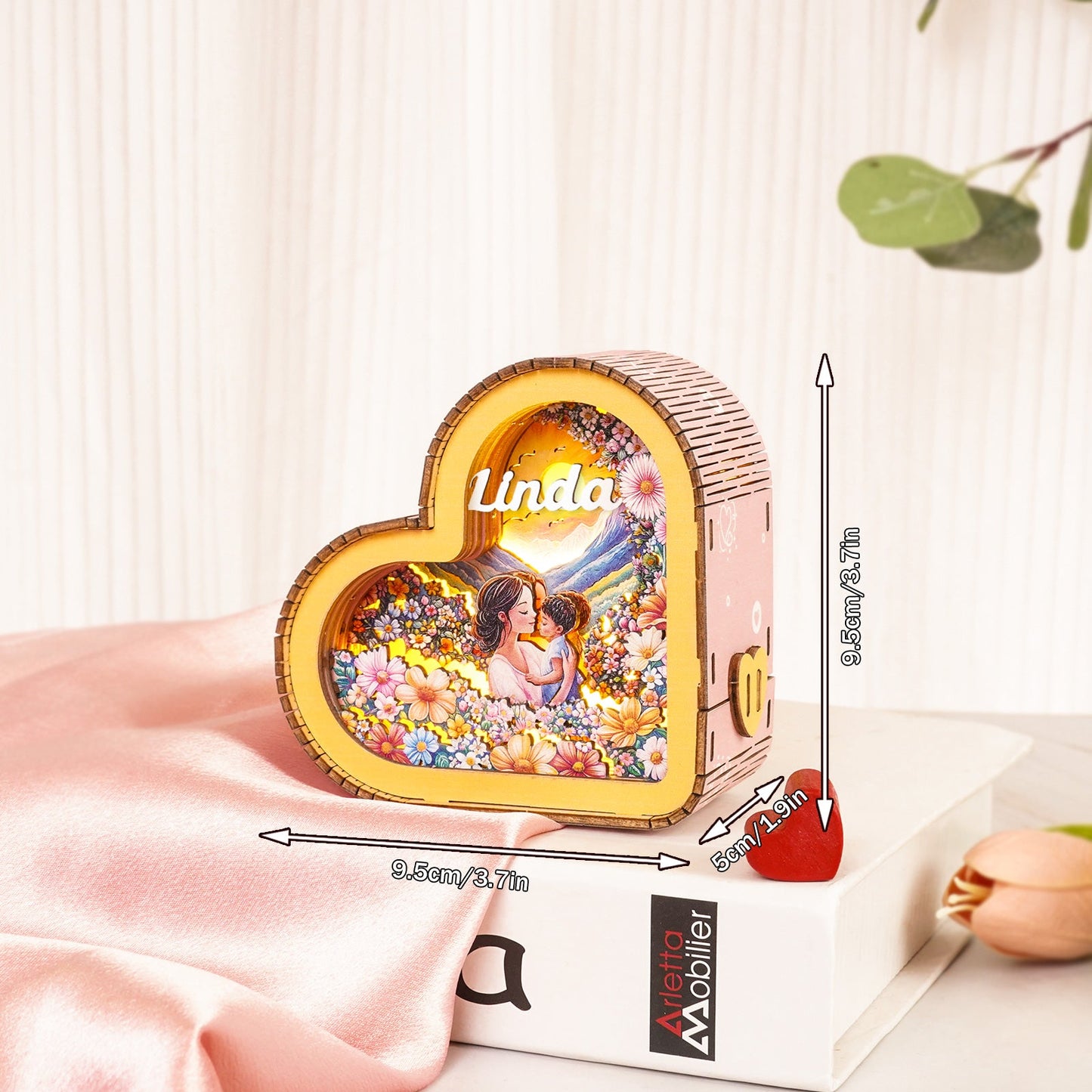 Personalized 3D Wooden Puzzle Night Light in heart shape featuring mother-child illustration and custom name 'Linda'.