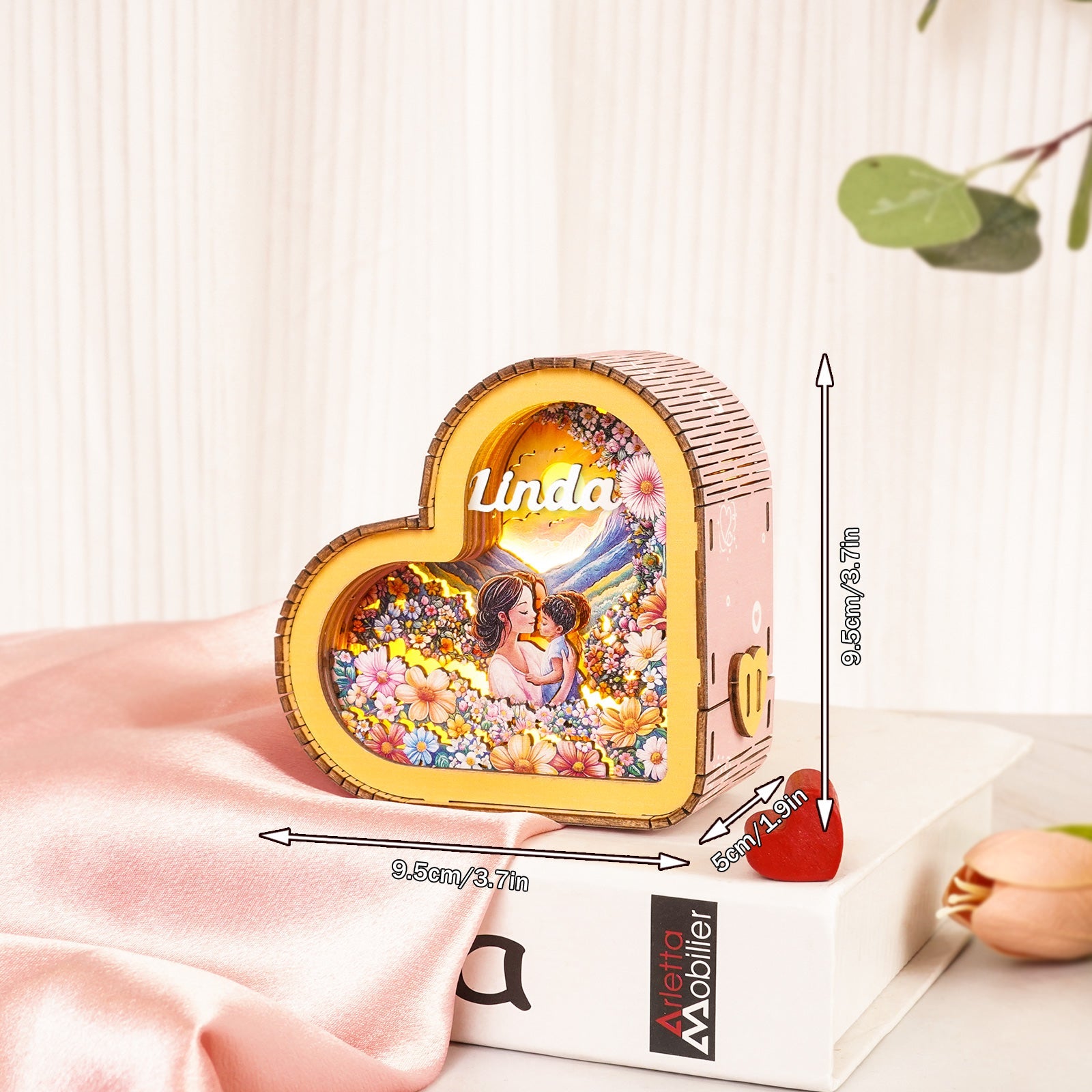 Personalized 3D Wooden Puzzle Night Light in heart shape featuring mother-child illustration and custom name 'Linda'.